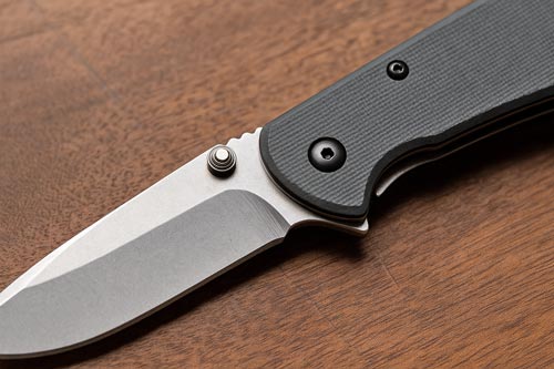 Close up of a folding knife showing its locking mechanism